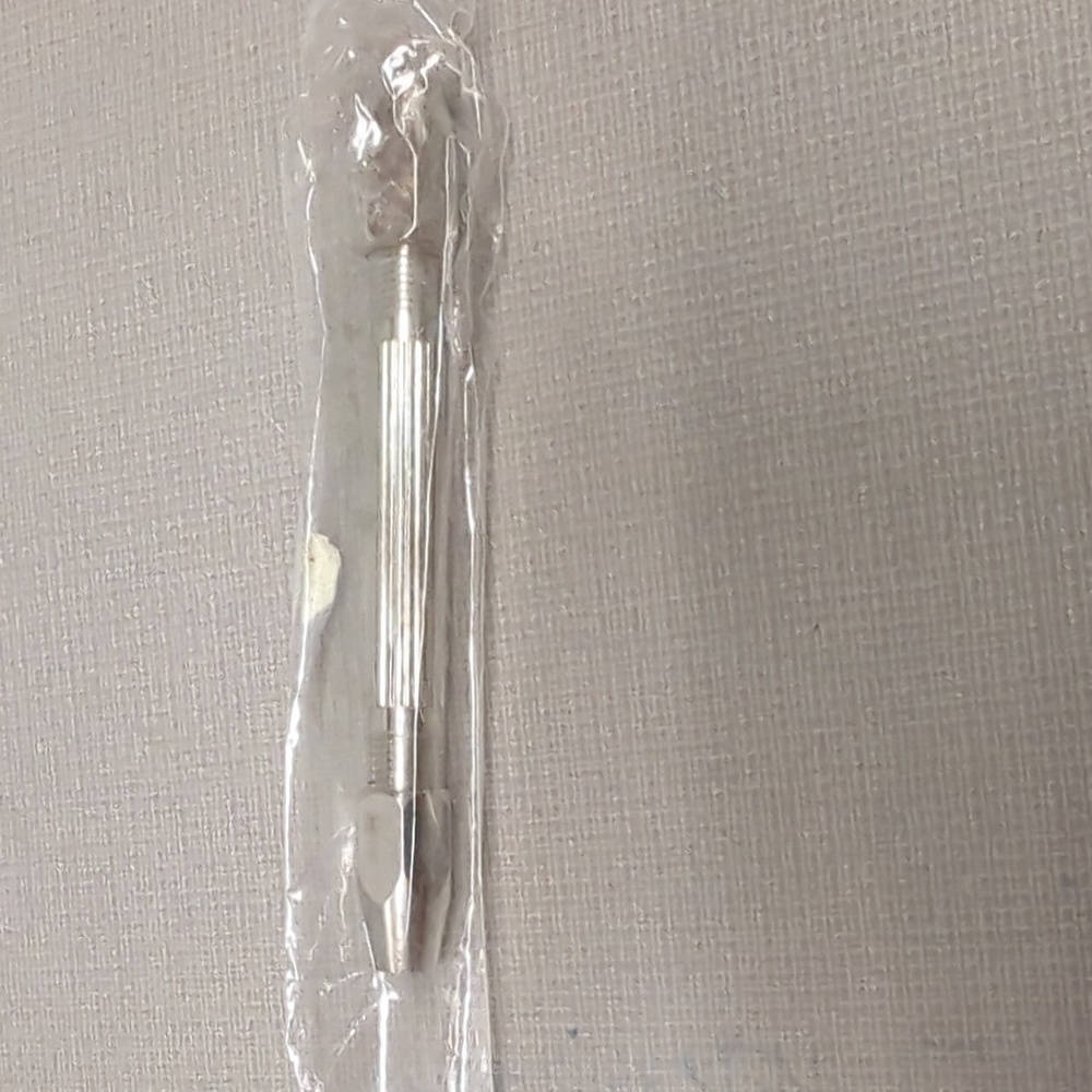 Double-ended pin vises, which are precision hand tools used by jewelers, Artisan